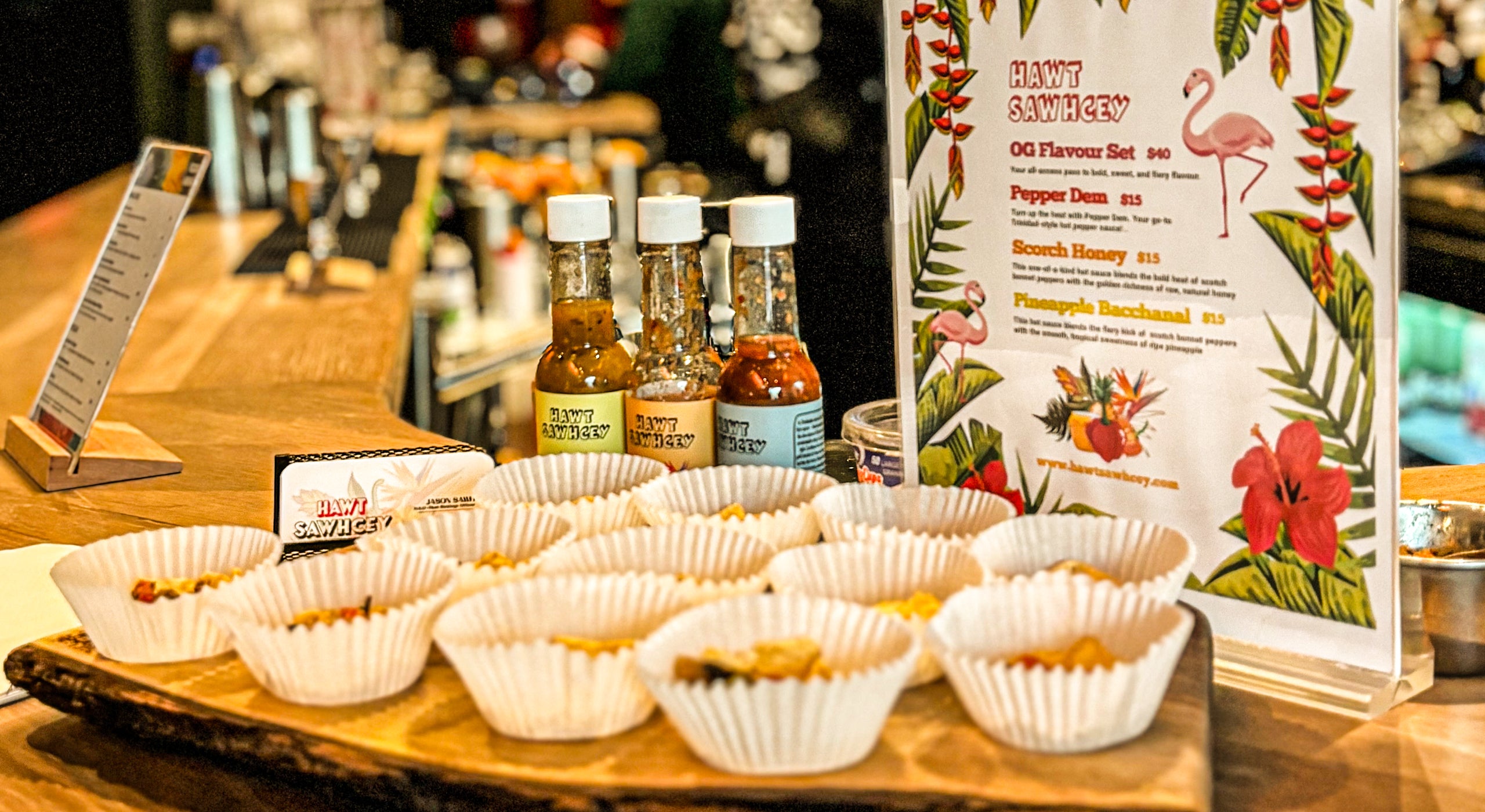 Hawt Sawhcey three-bottle hot sauce set on display