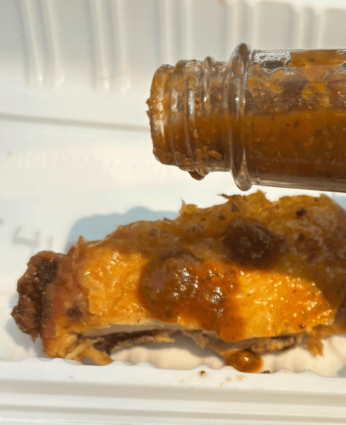 Plenty Peppa hot sauce drizzled over fried chicken